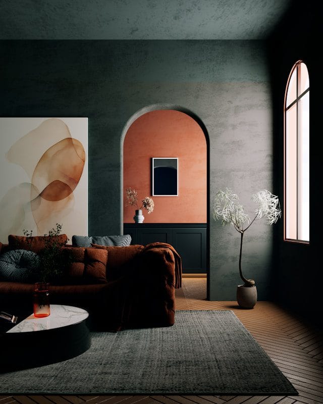 Modern living room with arched doorway and abstract art.