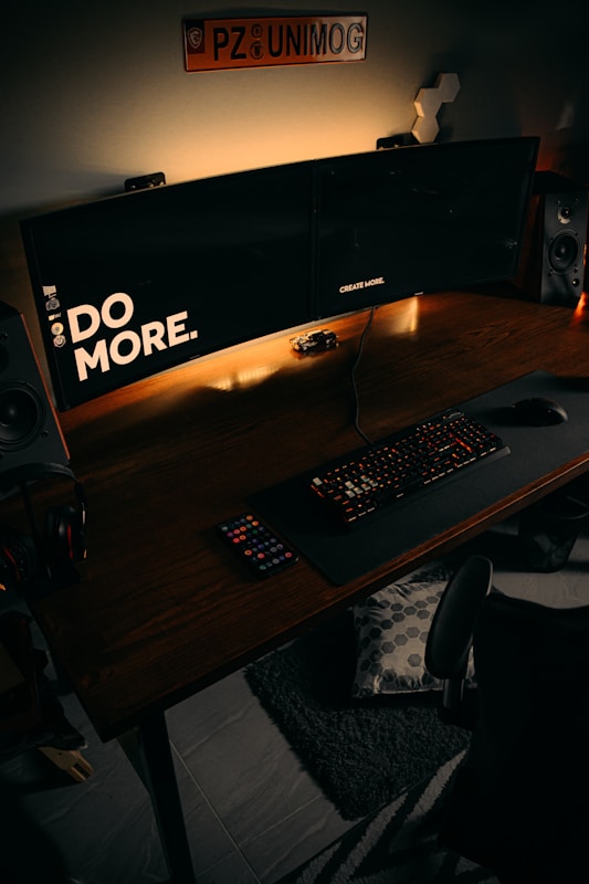 black computer keyboard on brown wooden desk