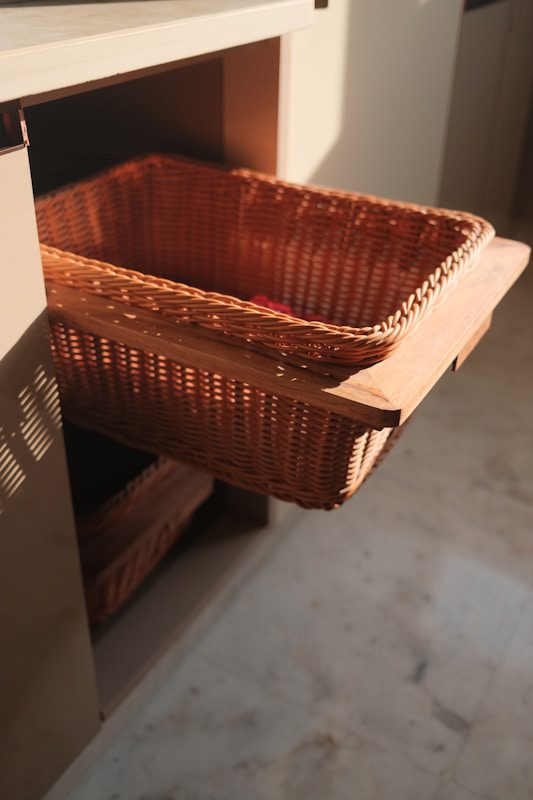 a wicker basket sitting on top of a counter